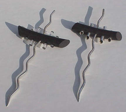 silver and rubber with perspex